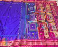 Detailed view of the Purple Pure Ilkal Silk Saree palla and border, showcasing the colourful Lambani hand embroidery and distinctive traditional design.