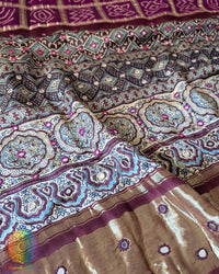 Close-up of Hand-Stitched Real Mirror Work on Ajrakh Palla of Purple Bandhani Saree