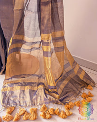 Pom pom detailing on purple saree