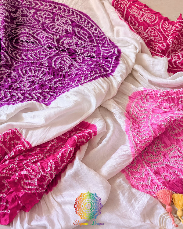 Close-up of the White Gajji Silk Purple Pink Orange Bandhani Dupatta, highlighting the traditional dotted Bandhani motifs and detailed tie-dye patterns in vivid colours.