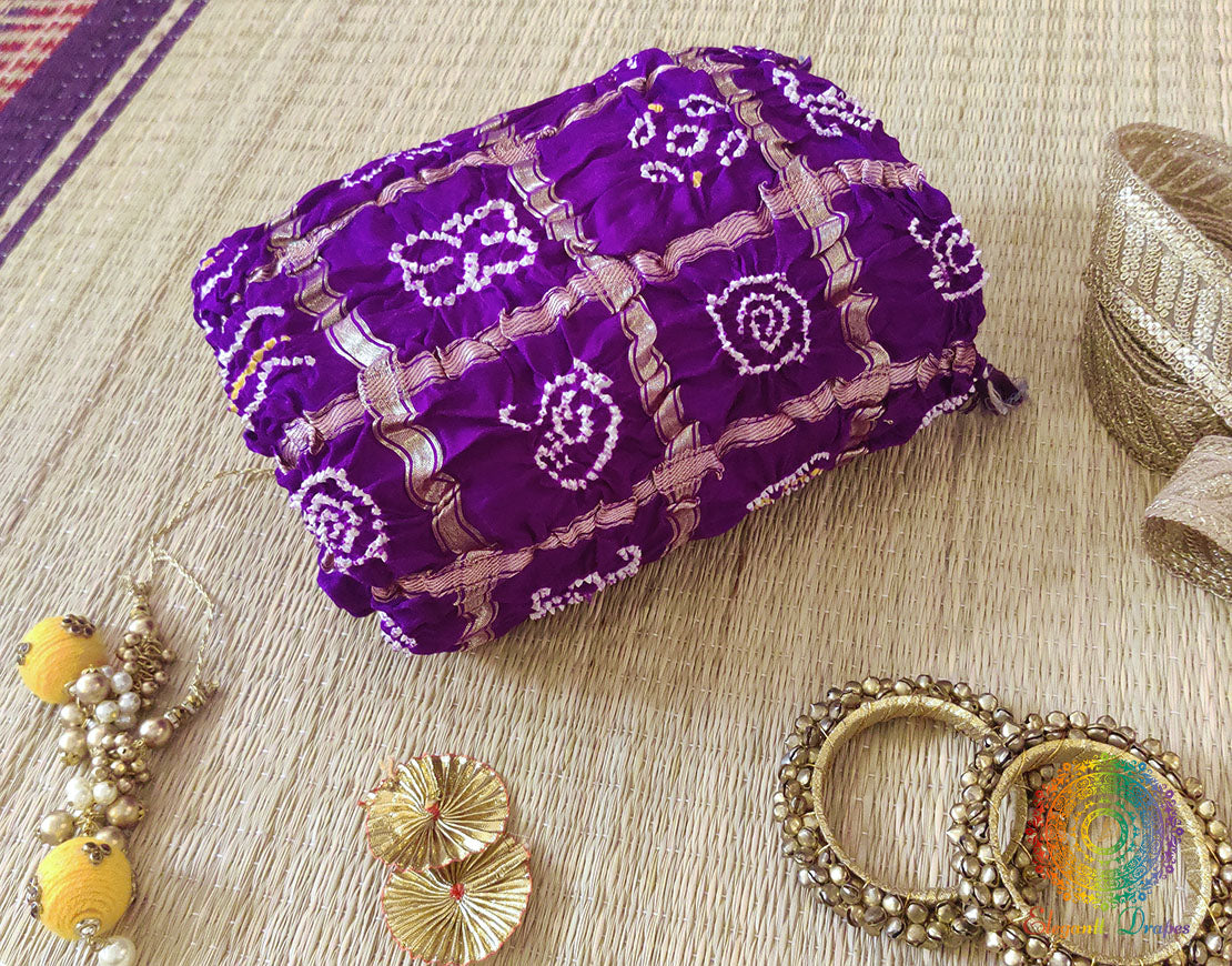 Intricate Gold Zari Palav and hand-crafted Bandhani work on a luxurious Purple Gaji Silk Dupatta.
