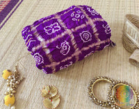 Intricate Gold Zari Palav and hand-crafted Bandhani work on a luxurious Purple Gaji Silk Dupatta.