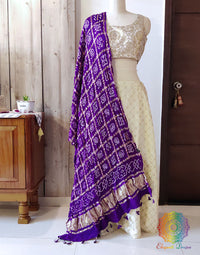 Elegantt Drapes Purple Pure Gaji Silk Bandhani Gharchola Dupatta with traditional white and yellow hand-tied Bandhej dots.