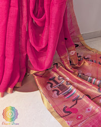 Pleats detail of rani pink linen saree showing texture and structure