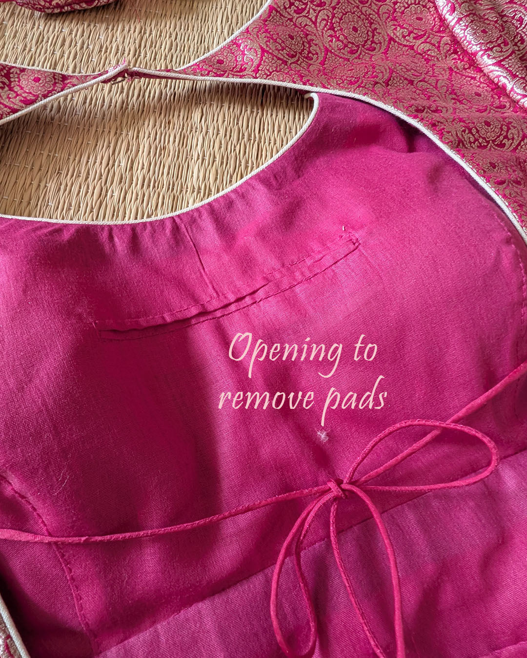 Interior view of the Rani Pink Banarasi Brocade Halter Neck Designer Blouse showing removable pad access