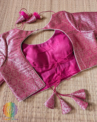Double dori back tie-up with matching brocade tassels on the Rani Pink Designer Blouse