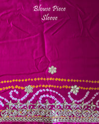 Close-up of the matching blouse sleeve with coordinated Gota Patti detailing