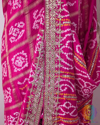 Detailed border featuring Gota Patti handwork on the Magenta Pink Gaji Silk Gharchola Saree