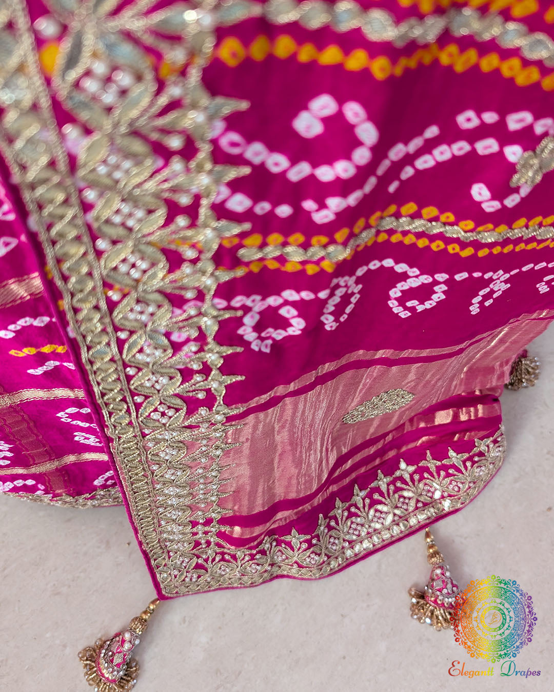 Full pallu view of the Magenta Pink Gharchola Saree with traditional Bandhani check pattern