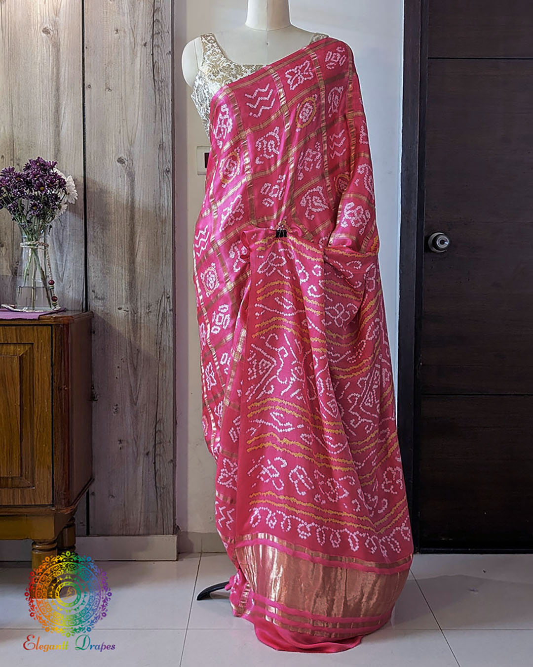 Magenta Gharchola gaji silk bandhani saree on mannequin showing full drape and silhouette