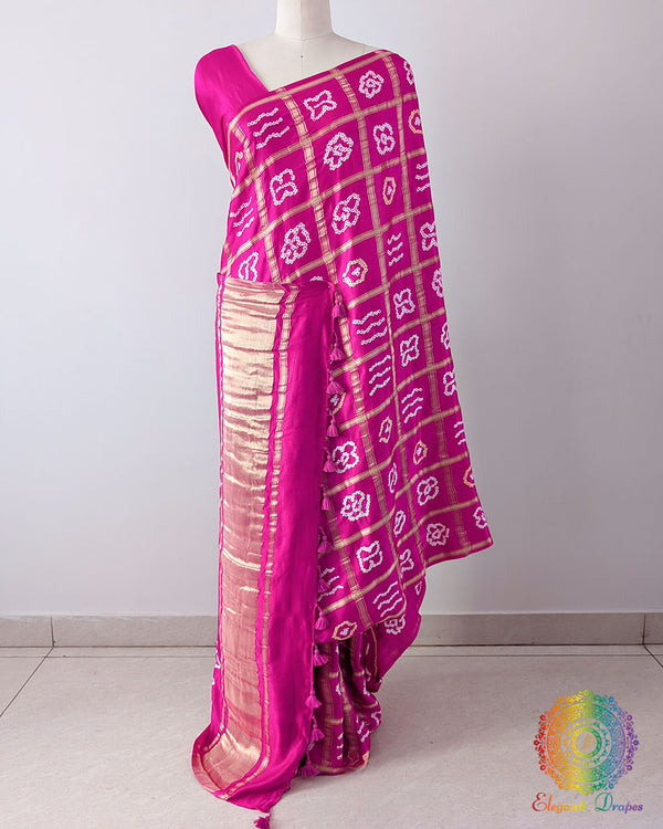 Pink Gharchola Pure Gajji Silk Bandhani Saree in a front drape view, showcasing the pink colour, traditional Gharchola pattern and rich silk finish.