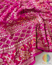 Close-up of Bandhani pattern on Rani Pink Shaded Khaddi Georgette Dupatta