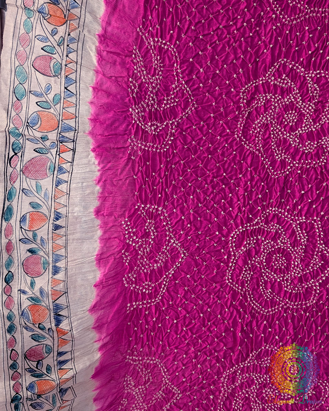 Detailed Bandhani pattern on the Rani Pink Muga Silk Dupatta