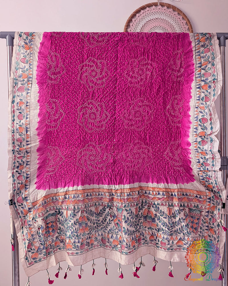 Rani Pink Muga Silk Dupatta with Bandhani body and hand-painted Madhubani artwork border