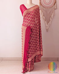 Red Khaddi georgette Banarasi Bandhani saree on mannequin showing full drape