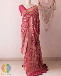 Red Khaddi georgette Banarasi Bandhani saree highlighting the intricately woven Banarasi palla