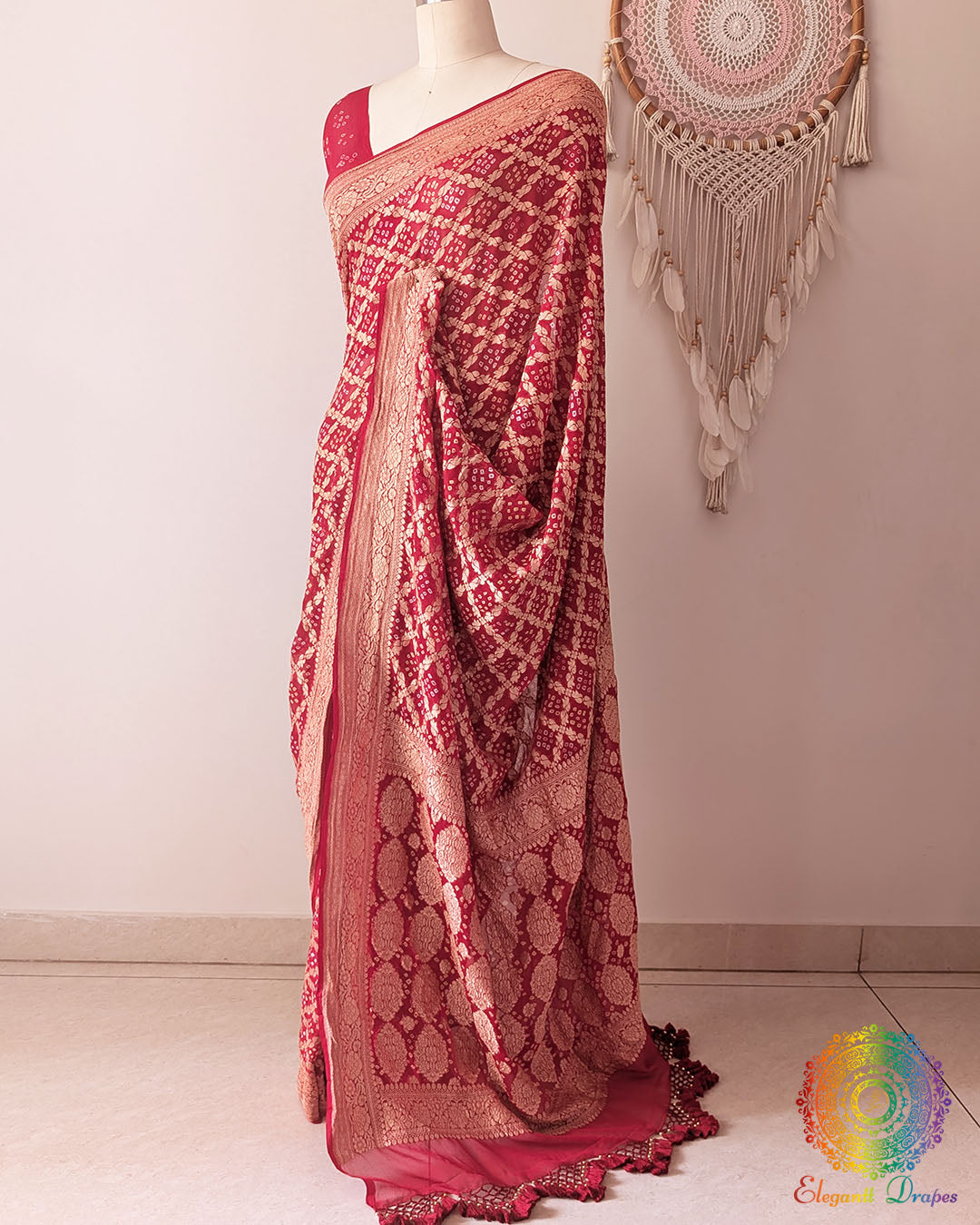 Side view of red Khaddi georgette Banarasi Bandhani saree showcasing elegant drape