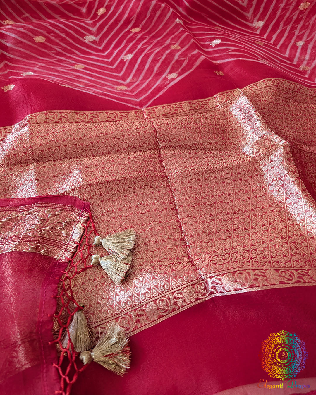 Close-up of Arashi Shibori pallu on Red Banarasi Handloom Kora Silk Saree
