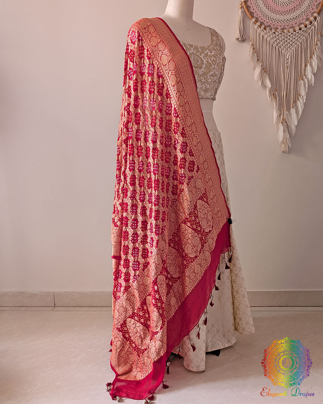 Side view of bridal red Banarasi georgette Gharchola Bandhani dupatta showcasing Gharchola checks, Bandhani motifs, and elegant drape