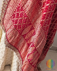 Festive red dupatta with lace border detailing