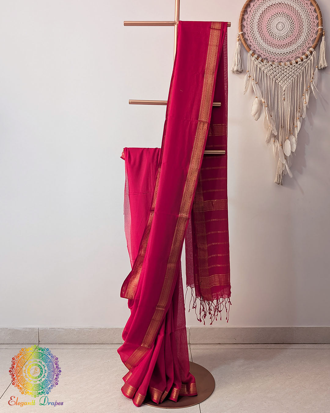Red Bengal cotton saree with zari border on mannequin showing full drape