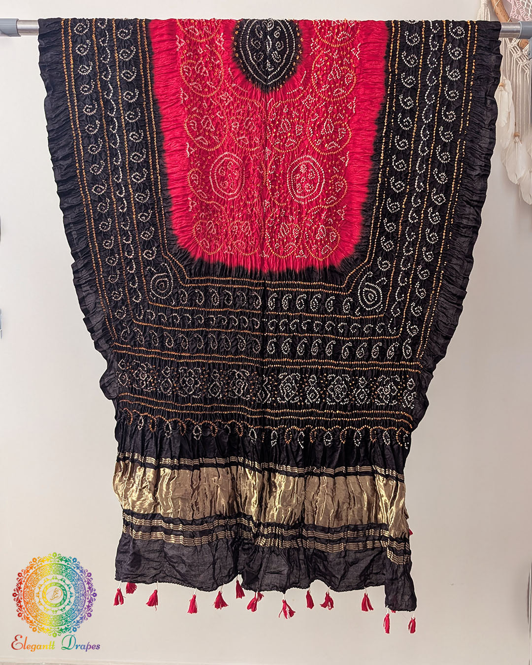 Close up of black red bandhani gaji silk dupatta showing tie dye detail