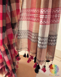 Intricately woven Jamdani palla on red and black Madras checks Bengal cotton saree