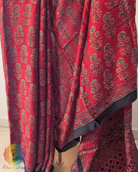 Ajrakh hand block print detail on red modal silk saree