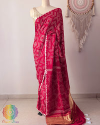 Red gaji silk bareek bandhej saree on mannequin showing full drape and silhouette