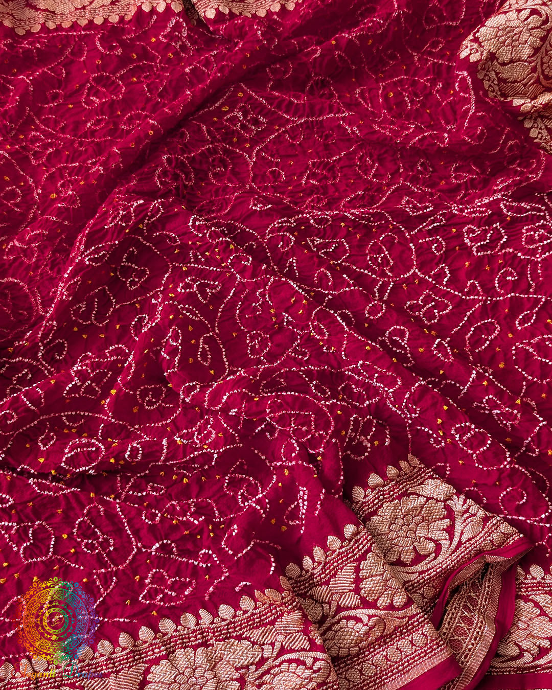 Close-up of Rai Bandhej detailing on Red Banarasi Khaddi Georgette Dupatta