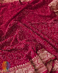 Close-up of Rai Bandhej detailing on Red Banarasi Khaddi Georgette Dupatta