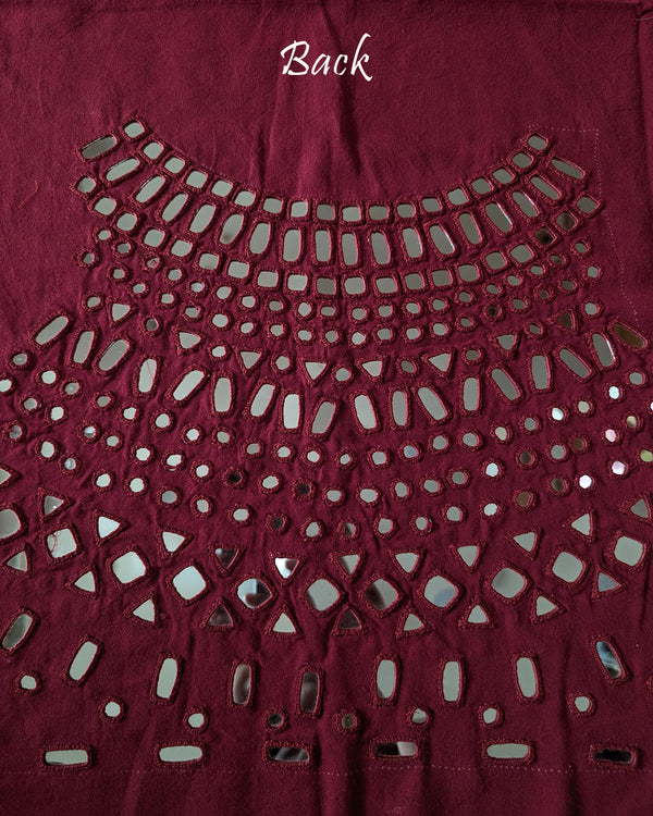 Back view of the Deep Red Kala Cotton Kutch Mirror Handwork blouse piece, showcasing intricate Kutch embroidery and real mirrors arranged in a decorative handcrafted design.