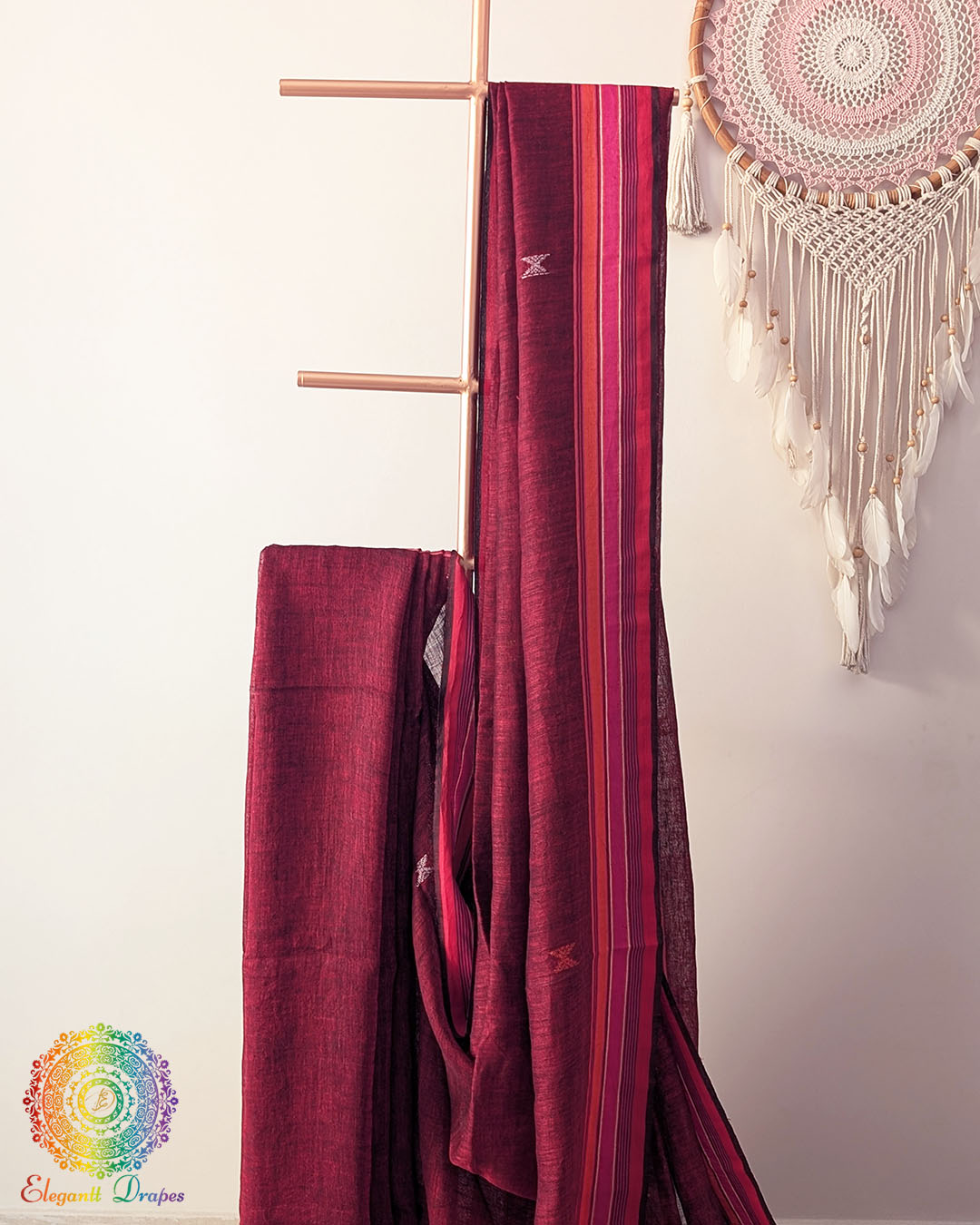 Red linen saree body close up highlighting Bhujodi weave texture