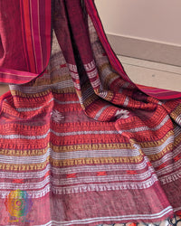 Palla close up on red linen saree highlighting Bhujodi weave detail