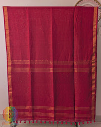 Full red linen saree laid open showing overall design and layout
