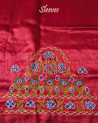Sleeve embroidery detail on red Kutch work Mashru silk blouse fabric