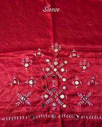 Close-up of Kutch mirror embroidery on sleeve of Red Mashru Silk Blouse Piece