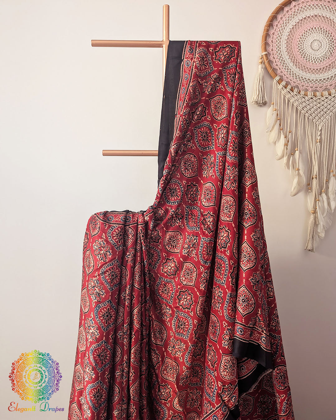 Close up of deep red modal silk Ajrakh block print saree