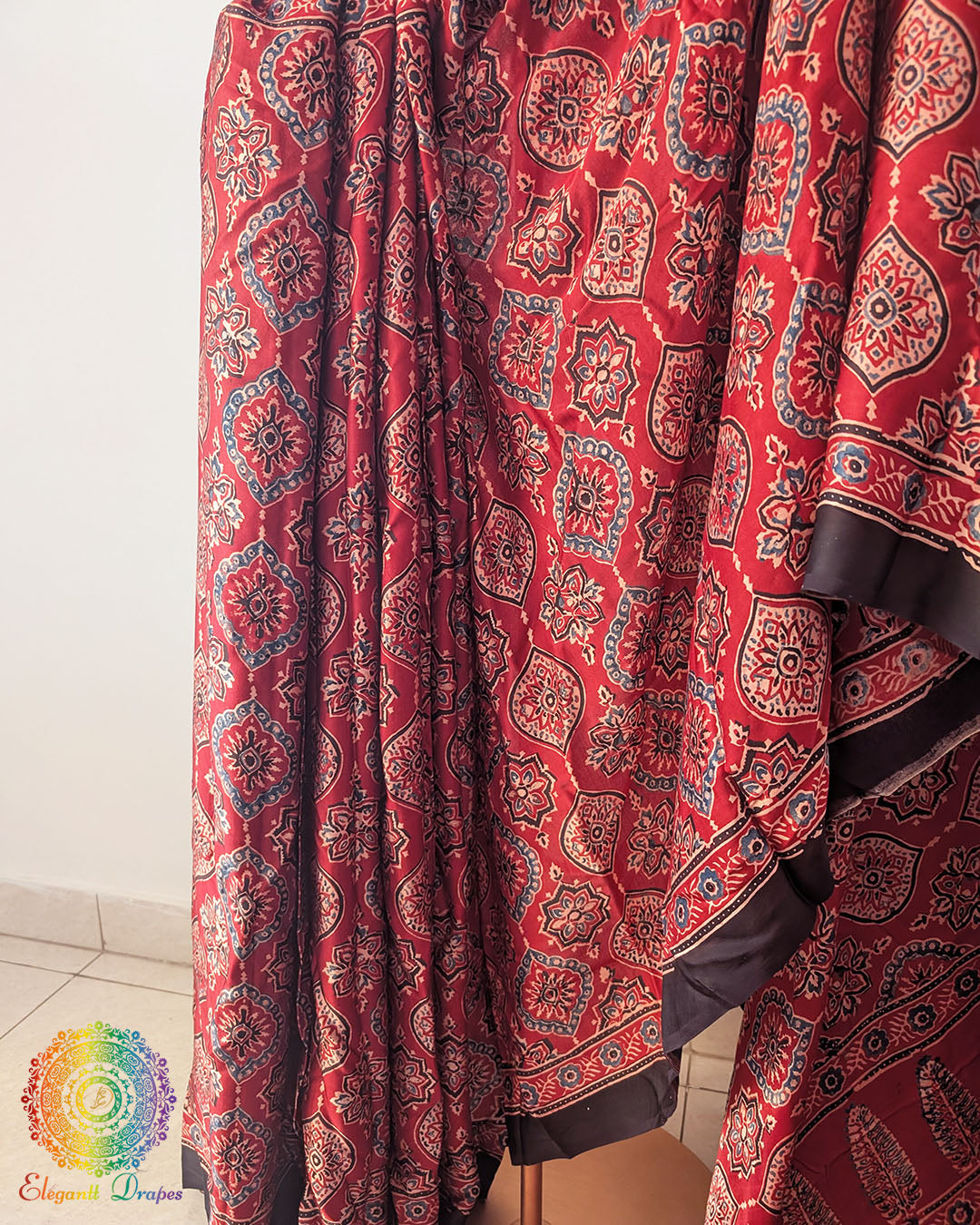 Deep red modal silk Ajrakh saree palla view