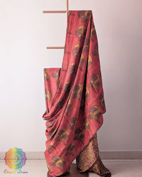 Red Nashpal Pomegranate Ajrakh Modal Tussar Silk Saree with the palla fully opened, showcasing the rich red shade and traditional floral Ajrakh design.