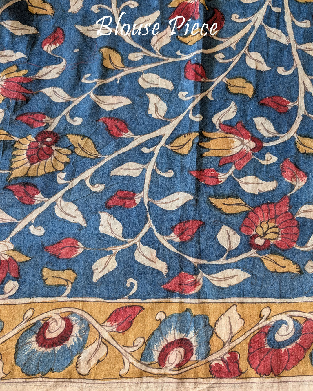 Matching Kalamkari blouse piece of the Red Bandhani Kalamkari Muga Silk Saree showcasing coordinated traditional artwork
