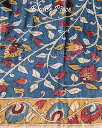 Matching Kalamkari blouse piece of the Red Bandhani Kalamkari Muga Silk Saree showcasing coordinated traditional artwork