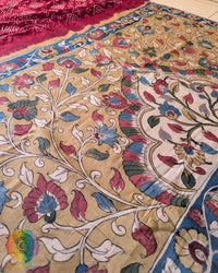 Full flat lay of the Red Bandhani Kalamkari Muga Silk Saree showcasing the complete Bandhani body and Kalamkari pallu