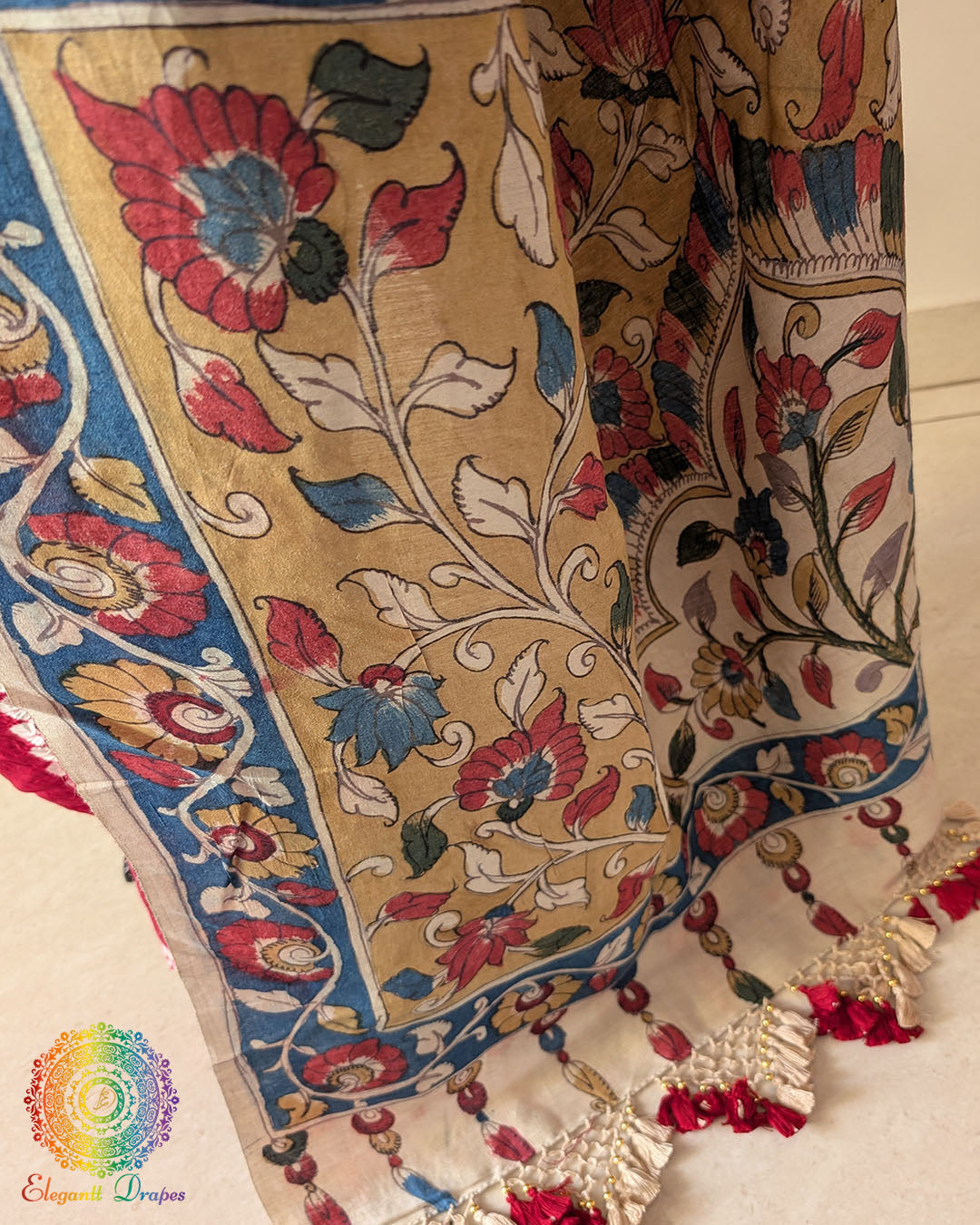 Detailed view of the border on the Red Bandhani Kalamkari Muga Silk Saree