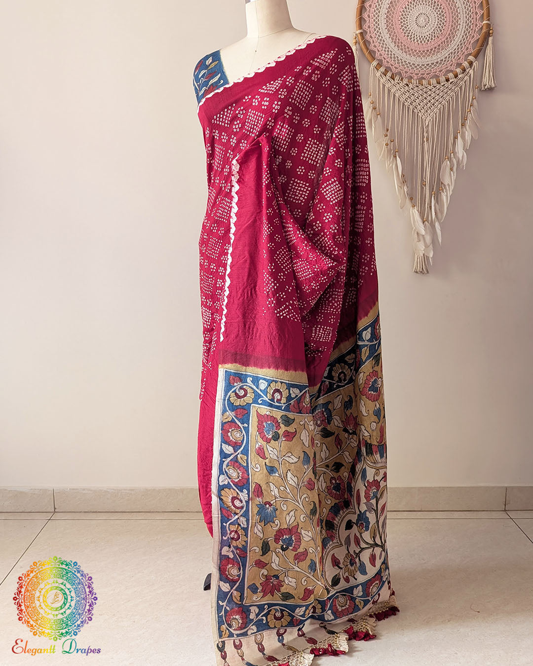 Side view of the Red Bandhani Kalamkari Muga Silk Saree showcasing the graceful silhouette and rich Muga Silk texture