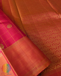 Red Checkered Pure Kanjivaram Silk Saree – Gold Zari Border Detail showcasing the intricate woven zari pattern and traditional border craftsmanship against the red silk.