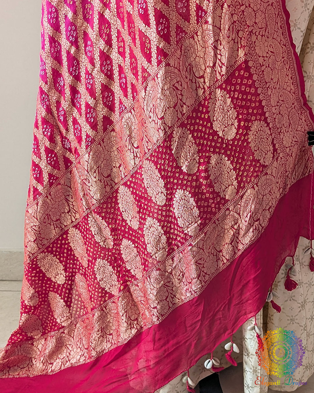 Close-up of Gharchola and Bandhani detailing on Red Pink Shaded Banarasi Georgette Dupatta