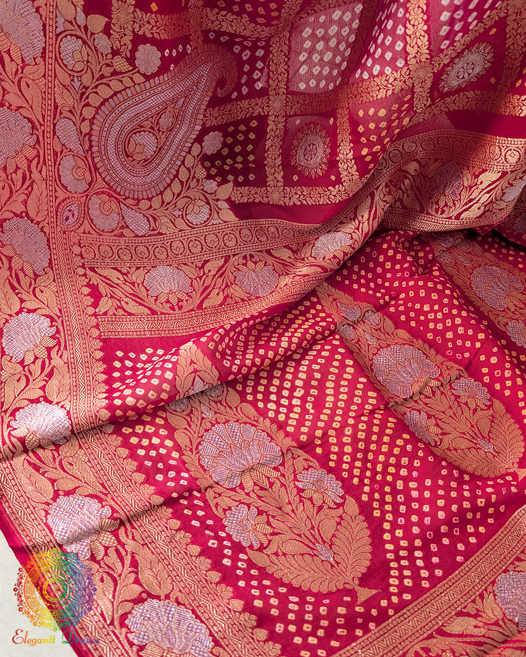 Detailed view of Gharchola pattern and zari weave on red pink saree palla