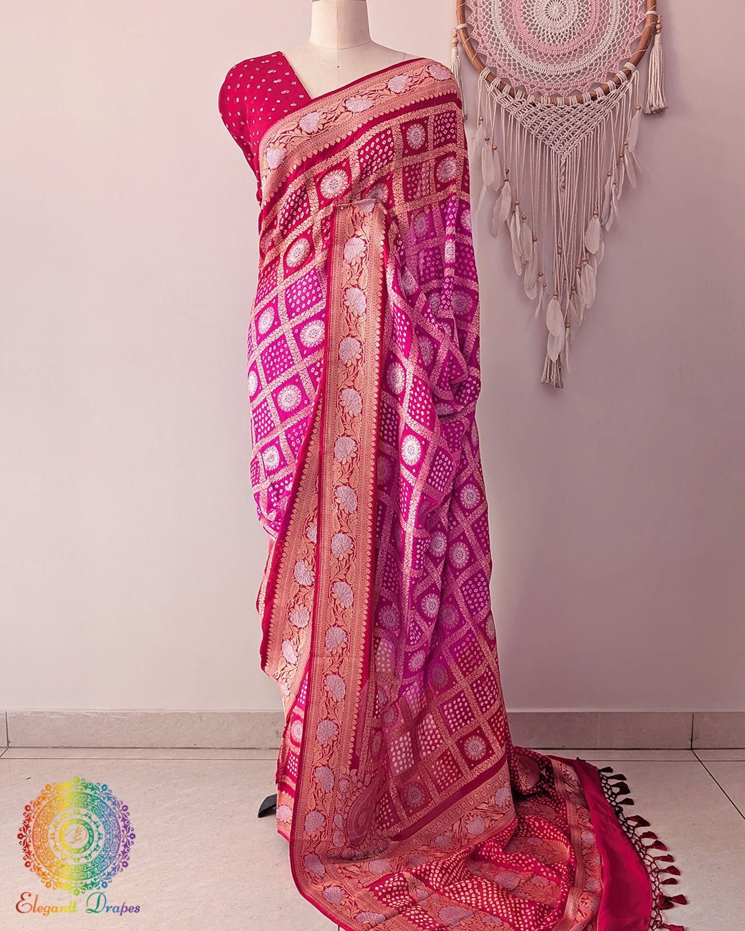 Red pink Banarasi khaddi georgette bandhej saree on mannequin showing full drape