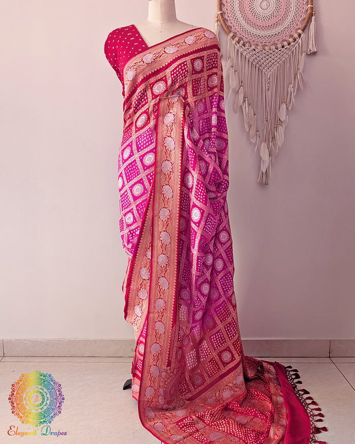 Red pink Banarasi khaddi georgette bandhej saree on mannequin showing full drape